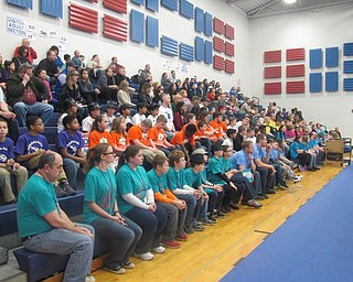 Neighbors | Zack Shively.The audience and the 15 teams at the FIRST LEGO League competition at Austintown Middle School listened for rules on scoring at the competition.