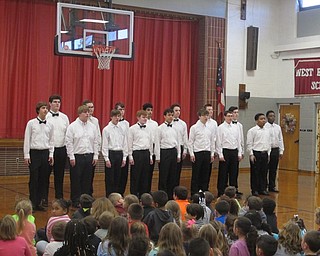 Neighbors | Zack Shively.Linda Smrek directed the choir with help from Laura Kotheimer and had a piano accompaniment from Linda Taylor. Pictured, the Spartan Singers performed "No Place Like Home for the Holidays."