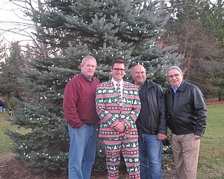 Neighbors | Zack Shively.Members of the community came to the Community Christmas to support the park, decorate trees and see the Winter Wonderland displays be lit. Pictured are, from left, Boardman Township Trustee Brad Calhoun, Township Administrator Jason Loree, Trustee Larry Moliterno and Tom Costello.