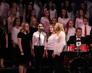 Neighbors | Abby Slanker.Four Canfield Village Middle School students were highlighted during the finale of “Have Yourself a Merry Little Christmas” at the school’s annual winter choir concert on Dec. 5.