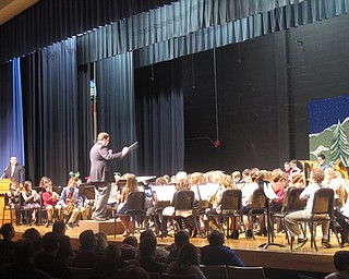 Neighbors | Zack Shively.The fifth grade's band has 102 members and played the songs, "First Performance," “Good King Wenceslas” and “Jingle Bells” during their performance.