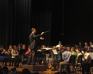 Neighbors | Zack Shively.Jeff Penny thanked high school director Jeff Hvizdos for his help in integrating to the school's music program. Hvizdos previously taught the middle school bands. Penny showed his appreciation by allowing Hvizdos direct the sixth grade's “Jolly Old Sleigh Ride.“