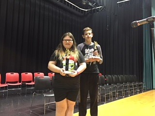 Struthers Middle School Spelling Bee took place Dec. 20 and ran for more than 20 rounds with Nevaeh Jones, sixth-grade student, winning by correctly spelling “nightingale.” Nevaeh will be sending in the Vindicator Spelling Bee form this week. Above, are Nevaeh and the runner-up, Kyle Johnson.