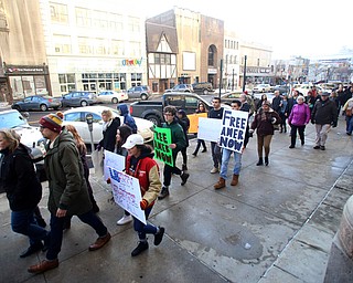 Protestors march in support of Al Adi to the Nathaniel R. Jones Federal Building & U.S. Courthouse, Saturday, Jan. 20, 2018, in Youngstown...(Nikos Frazier | The Vindicator)