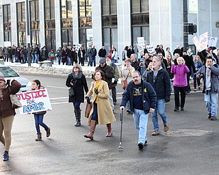 Protestors march in support of Al Adi to the Nathaniel R. Jones Federal Building & U.S. Courthouse, Saturday, Jan. 20, 2018, in Youngstown...(Nikos Frazier | The Vindicator)