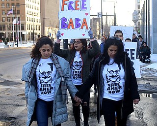 Fidaa Musleh and daughter, Lana Adi march in support of their husband/father, Al Adi, to the Nathaniel R. Jones Federal Building & U.S. Courthouse, Saturday, Jan. 20, 2018, in Youngstown...(Nikos Frazier | The Vindicator)