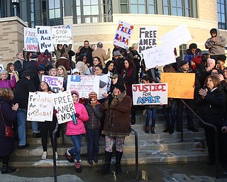 Protestors hold a rally for Al Adi's release in front of the Nathaniel R. Jones Federal Building & U.S. Courthouse, Saturday, Jan. 20, 2018, in Youngstown...(Nikos Frazier | The Vindicator)