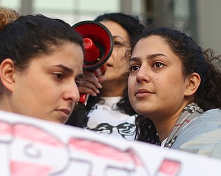 Lana Adi listens to her mother, Fidaa Musleh speak during a rally for Al Adi's release, Saturday, Jan. 20, 2018, at the Nathaniel R. Jones Federal Building & U.S. Courthouse in Youngstown...(Nikos Frazier | The Vindicator)