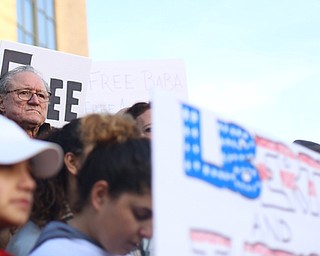 Former State Rep. Bob Hagan(D-Ohio) listens to Fidaa Musleh speak during a rally for Al Adi's release, Saturday, Jan. 20, 2018, at the Nathaniel R. Jones Federal Building & U.S. Courthouse in Youngstown...(Nikos Frazier | The Vindicator)