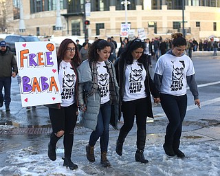 (from left) Rania Adi, Lana Adi, Fidaa Musleh and Lina Adi march back after holding a rally for Al Adi's release, Saturday, Jan. 20, 2018, at the Nathaniel R. Jones Federal Building & U.S. Courthouse in Youngstown...(Nikos Frazier | The Vindicator)