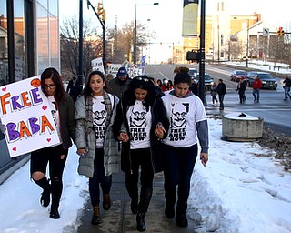 (from left) Rania Adi, Lana Adi, Fidaa Musleh and Lina Adi march back after holding a rally for Al Adi's release, Saturday, Jan. 20, 2018, at the Nathaniel R. Jones Federal Building & U.S. Courthouse in Youngstown...(Nikos Frazier | The Vindicator)