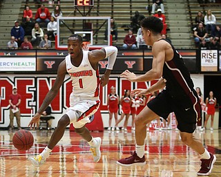 Youngstown State guard Braun Hartfield (1) drives past IUPUI guard D.J.ÊMcCall (22) in the first half of an NCAA college basketball game, Saturday, Jan. 20, 2018, in Youngstown. YSU won 85-62...(Nikos Frazier | The Vindicator)