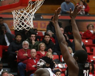 Youngstown State guard Jeremiah Ferguson (5) goes up for a layup past IUPUI forward MauriceÊKirby (31) in the first half of an NCAA college basketball game, Saturday, Jan. 20, 2018, in Youngstown. YSU won 85-62...(Nikos Frazier | The Vindicator)