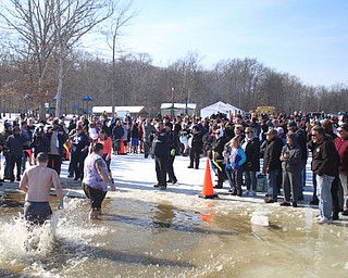 Participants in the annual Polar Bear Plunge in mid 30 degree water for the Special Olympics, Saturday, Jan. 20, 2018, at the Mosquito Lake State Park Swimming Beach in Cortland...(Nikos Frazier | The Vindicator)
