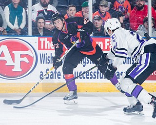 Scott R. Galvin | The Vindicator.Youngstown Phantoms defenseman Michael Joyaux (62) takes a shot on net against Tri-City Storm defenseman Hugo Blix (23) during the first period at the Covelli Centre on Saturday, January 20, 2018.