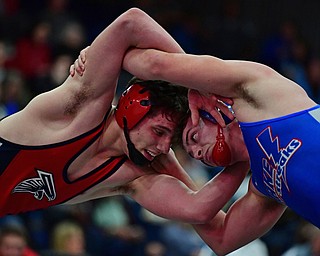 AUSTINTOWN, OHIO - JANUARY 20, 2018: Fitch's Michael Ferree grapples with Lake's Sean-Michael James during their 160lb championship bout, Saturday night at Austintown Fitch High school. DAVID DERMER | THE VINDICATOR