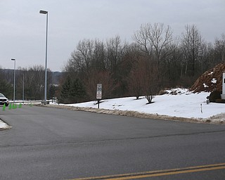 A security guard blocks off the entrance as 200 community members protest the detainment of Al Adi, Sunday, Jan. 21, 2018, outside the Northeast Ohio Correctional Facility in Youngstown...(Nikos Frazier | The Vindicator)