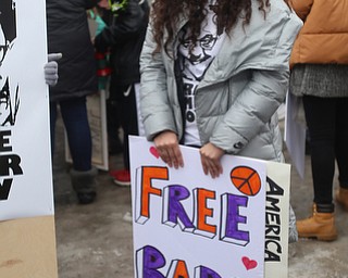 Lana Adi holds a sign at a protest rally demanding the release of her father, Al Adi, Sunday, Jan. 21, 2018, outside the Northeast Ohio Correctional Facility in Youngstown...(Nikos Frazier | The Vindicator)