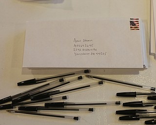 Envelopes with Al's prison address sit on a table as community members come together to write letters to Adi, Monday, Jan. 22, 2018, at Downtown Circle in Youngstown...(Nikos Frazier | The Vindicator)