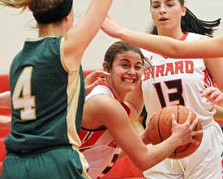 William D. Lewis The Vindicator   Giard's Samantha Cave(3) passes around Lakeside's Dani Melnik(40 as Girard'sOliviaCiminero(130 looks on during 1-22-18 action at Girard.