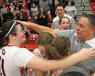 William D. Lewis The Vindicator Girard girls coach Andy Saxon celebrates his 400th career win against Lakeside 1-22-18  at Girard. At left is Sophia Strollo(11).