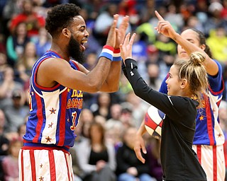 Globetrotters Ant congradulates Gianna Pompelia(10) of Howland, Jan. 24, 2018, at the Covelli Centre in Youngstown...(Nikos Frazier | The Vindicator)