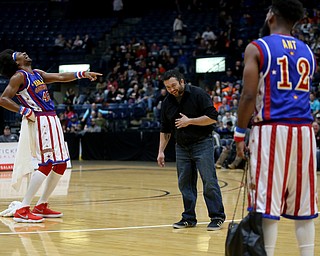 Globetrotter Moose makes fun of Eddie Bonilla of Struthers, Jan. 24, 2018, at the Covelli Centre in Youngstown...(Nikos Frazier | The Vindicator)