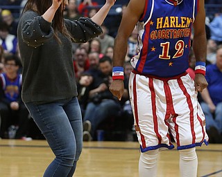 Globetrotter Ant dances with Amber Bonilla of Struthers, Jan. 24, 2018, at the Covelli Centre in Youngstown...(Nikos Frazier | The Vindicator)