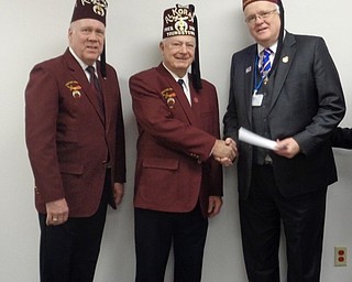 Youngstown Shrine Club recently presented a $12,500 check to Shriners Hospital for Children – Erie, Pa. The club’s next fundraising event for the hospital will be a beer taste that will take place at 7 p.m. Feb. 3 at 1735 W. South Range Road, state Route 165, North Lima. Cost is $25 per person and includes a variety of beers for sampling, refreshments and food as well as entertainment. Tickets can be purchased in advance from Lou Garland at 330-259-1216 and John Jones at 330-792-8892 or at the door. Above, from left, are Greg Anstrom, second vice president of Shrine Club; Jim Burnham, 2017 president of Shrine Club; and Jim McKinney, Board of Governors chairman of SHC – Erie.

