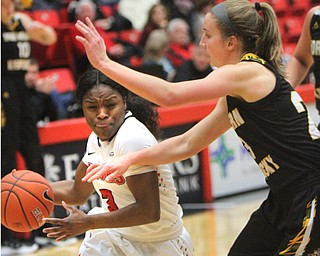 William D. Lewis The vindicator  YSU'sIndiya Benjamin(3) drives past NKU's Kailey Coffey(23) during 1-25-18 action at YSU.