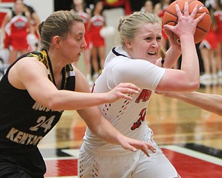 William D. Lewis The vindicator  YSU'sMcKenah Peters(34) tries to shoot past NKNUs Molly Glick(24) during 1-25-18 action at YSU.