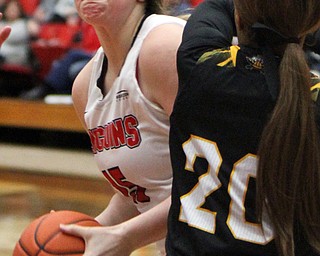 William D. Lewis The vindicator  YSU's Mary Dunn (15) tries to shoot past NKNUs Chyna Anthony(20)) during 1-25-18 action at YSU.