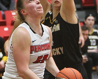 William D. Lewis The vindicator  YSU's Anne Secrest(50)) tries to shoot past NKU's Molly Glick(24)) during 1-25-18 action at YSU.