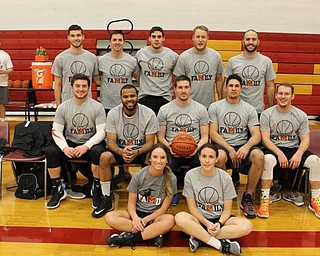 Neighbors | Submitted .Pictured is the gray team that participated in the Cardinal Mooney Alumni basketball game on Dec. 27. More than $2,500 was raised for Adopt-A-Student. The gray team came out victorious.