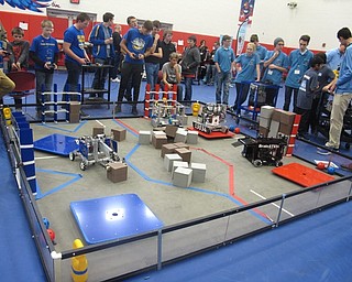 Neighbors | Zack Shively.Austintown hosted a FIRST Tech Challenge robotics competition at the Austintown Middle School on Dec 16. While Austintown did not compete, their robotics teams did volunteer at the event. Pictured, schools practice for the competition.