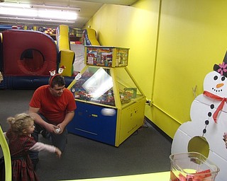 Neighbors | Zack Shively.In addition to the games in the arcade, Austintown Bounce's crew set up a couple of holiday themed games, such as the game pictured.