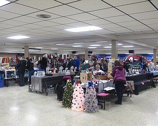 Neighbors | Zack Shively.Seventy-eight vendors participated in the Fitch concert choir's craft show. Each vendor had their own small section to sell their crafts. All the vendors made small gift baskets for a basket raffle during the event.