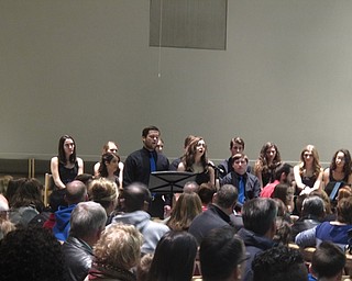 Neighbors | Zack Shively.The concert had performances from both the concert choir and the a cappella choir under the direction of Shannon Nicholson. Members of the choir also performed two duets, including "Baby It's Cold Outside," which is pictured.