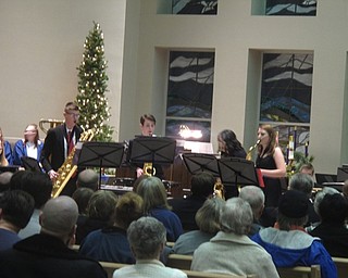 Neighbors | Zack Shively.Poland Seminary High School's holiday concert featured full groups, ensembles, duets and a sing along that incorporated everyone in the singing. Pictured, a saxophone quartet performed "Jingle Bells."