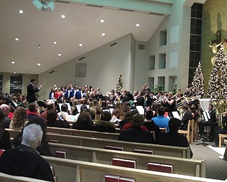Neighbors | Zack Shively.The PSHS wind ensemble and the choirs all joined together for a sing along, "Merry Christmas, Everyone!" The song featured verses from five holiday songs. The audience received a lyrics sheet for the song in the program and sang with the choir.