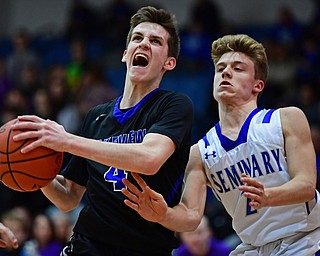 POLAND, OHIO - JANUARY 26, 2018: Lakeview's TJ Lynch, left, drives on Poland's Mike Diaz during the second half of their game on Friday night at Poland High School. DAVID DERMER | THE VINDICATOR