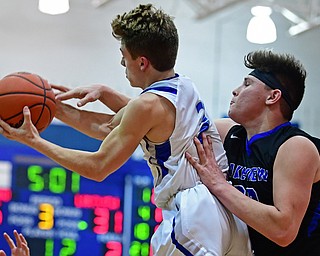 POLAND, OHIO - JANUARY 26, 2018: Poland's Mike Diaz grabs a rebound away from Lakeview's Drew Munno during the second half of their game on Friday night at Poland High School. DAVID DERMER | THE VINDICATOR