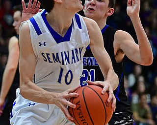 POLAND, OHIO - JANUARY 26, 2018: Poland's Daniel Kramer, left, looks to pass while being pressured by Lakeview's Jeff Remmick during the second half of their game on Friday night at Poland High School. DAVID DERMER | THE VINDICATOR