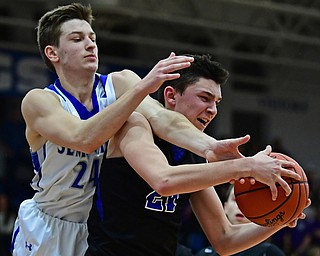 POLAND, OHIO - JANUARY 26, 2018: Lakeview's Jeff Remmick grabs a rebound away from Poland's Billy Orr during the second half of their game on Friday night at Poland High School. DAVID DERMER | THE VINDICATOR