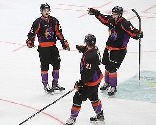 Youngstown Phantoms forward Matthew Barry (26) Youngstown Phantoms left wing Matt Thompson (27) and Youngstown Phantoms center Mike Regush (21) celebrate a goal in the second period of an USHL Hockey game against Dubuque, Sunday, Jan. 28, 2018, in Youngstown. Phantoms won 2-1...(Nikos Frazier | The Vindicator)