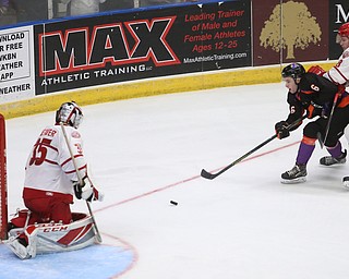Youngstown Phantoms right wing Max Ellis (6) attempts to score a goal past Dubuque Fighting Saints goalie Cole Weaver (35) in the second period of an USHL Hockey game, Sunday, Jan. 28, 2018, in Youngstown. Phantoms won 2-1...(Nikos Frazier | The Vindicator)