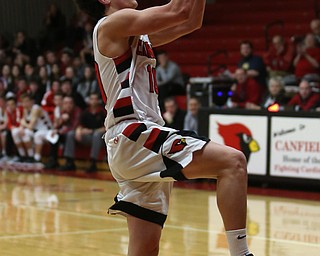 Canfield's forward Spencer Woolley (11) goes up for a layup in the second quarter of an AAC high school basketball game, Tuesday, Jan. 30, 2018, in Canfield. Canfield won 62-48...(Nikos Frazier | The Vindicator)