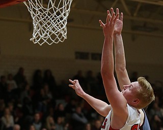 Canfield's guard Ian McGraw (22) goes up for a layup in the fourth quarter of an AAC high school basketball game, Tuesday, Jan. 30, 2018, in Canfield. Canfield won 62-48...(Nikos Frazier | The Vindicator)