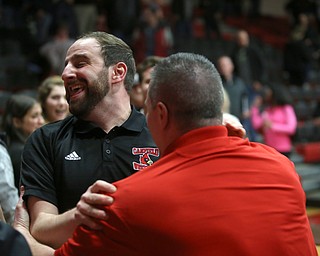 Canfield head coach Steve Pitts celebrates after defeating Louisville in the OHSAA Wrestling Division II Region 12 team finals, Wednesday, Jan. 31, 2018, in Canfield...(Nikos Frazier | The Vindicator)