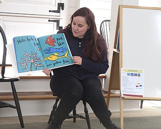 Neighbors | Zack Shively.Annette Ahrens led the Poland library's "Baby Brilliant: Tales and Talk for 2s and 3s" event on Dec. 28. They read books, sang songs and made a craft.